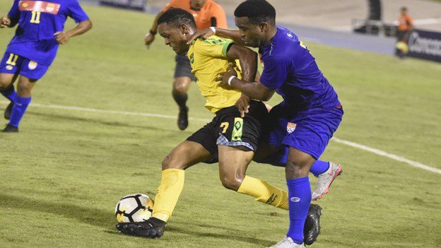 Clarke hits last-gasp penalty to secure share of spoils for Young Reggae Boyz