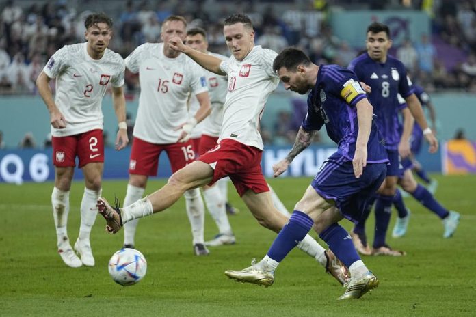 Messi and Argentina advance at World Cup, beat Poland 2-0