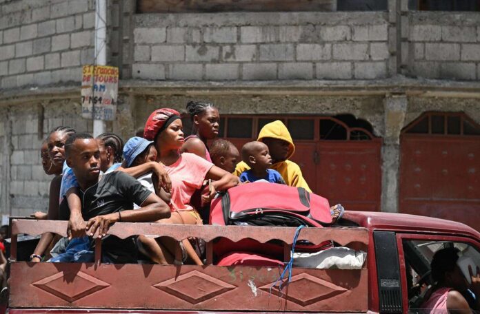 Residents evacuate Haiti