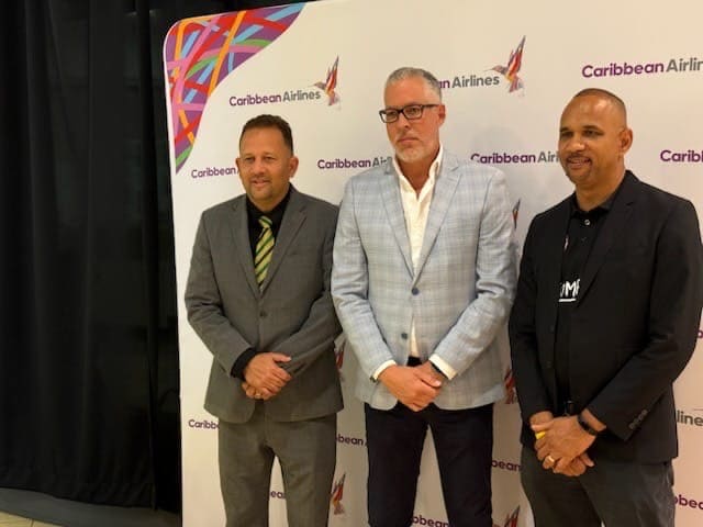 Jamaica's Consul Genenal Oliver Mair and Jamaica Tourist Board’s Phillip Rose join Caribbean Airlines CEO Garvin Medera to celebrate the airline’s new daily Montego Bay–Fort Lauderdale route.